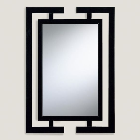 Настінне дзеркало в металевому обрамленні для лофт стилю