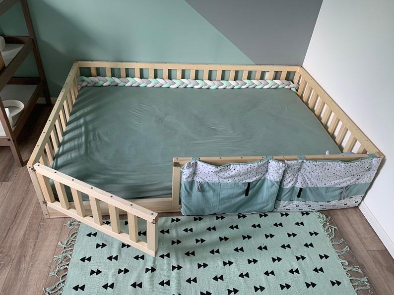 Підлогове ліжечко для новонароджених